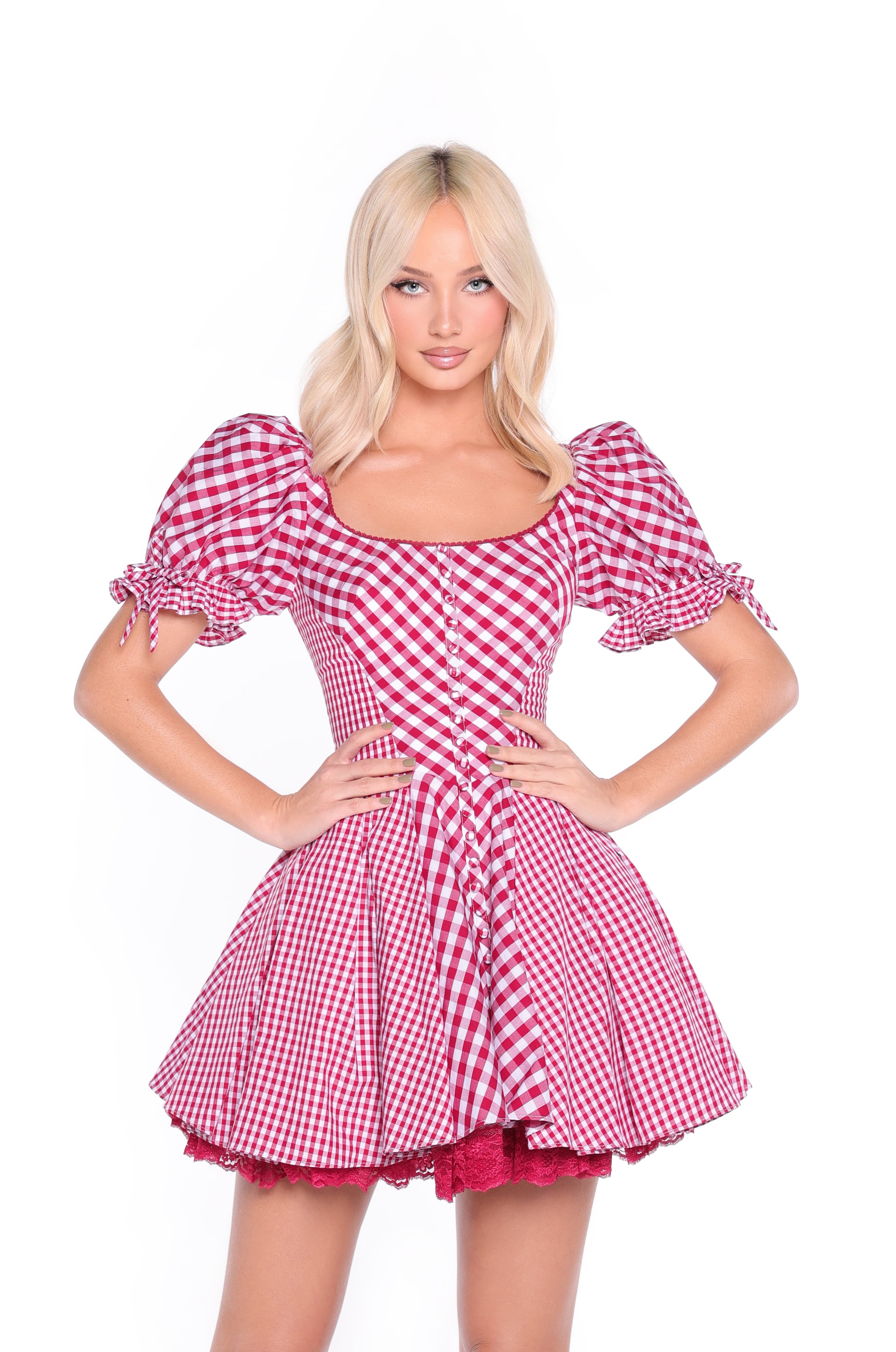 Model wears the Cherry Gingham Short Casual Dress: Roslyn, a red and white gingham dress with puffed sleeves. Perfect for summer, this vintage-inspired piece captures effortless cottagecore style against a white background.